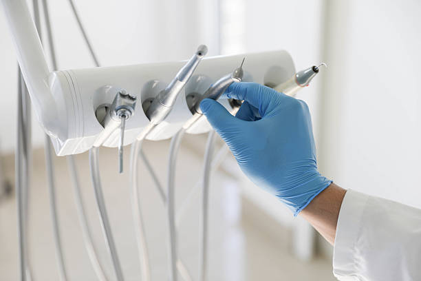 Professional Emergency Dentist technician working in Palmetto Bay, FL